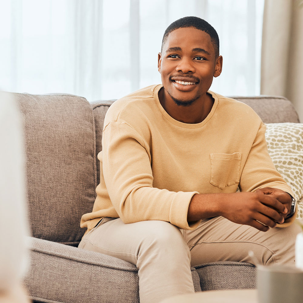 Smiling man in therapy session