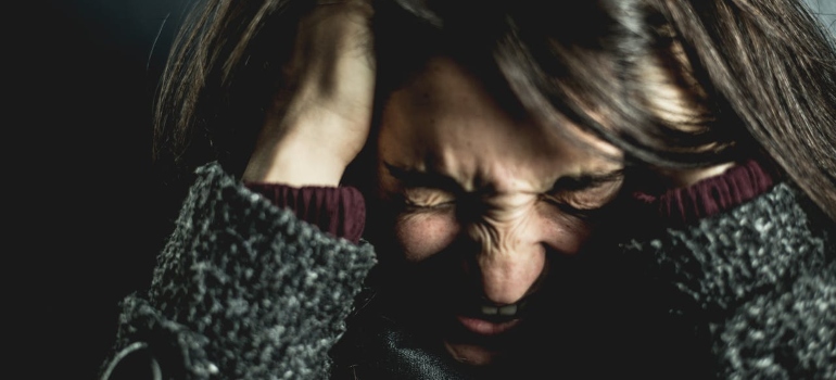 a girl with a severe headache