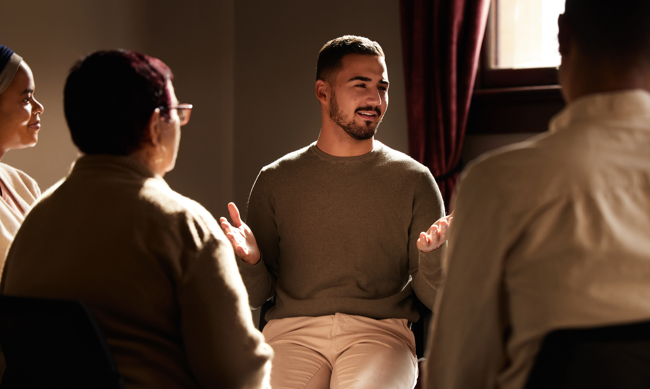 A man in group theray during Day Treatment in Massachusetts