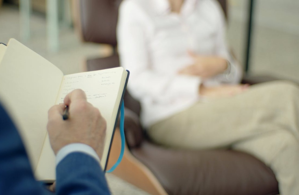 a therapist taking notes about pure OCD