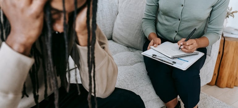 A trained psychotherapist helping a client understand why dissociation happens