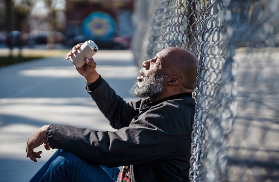 A man struggling with binge drinking and bipolar disorder