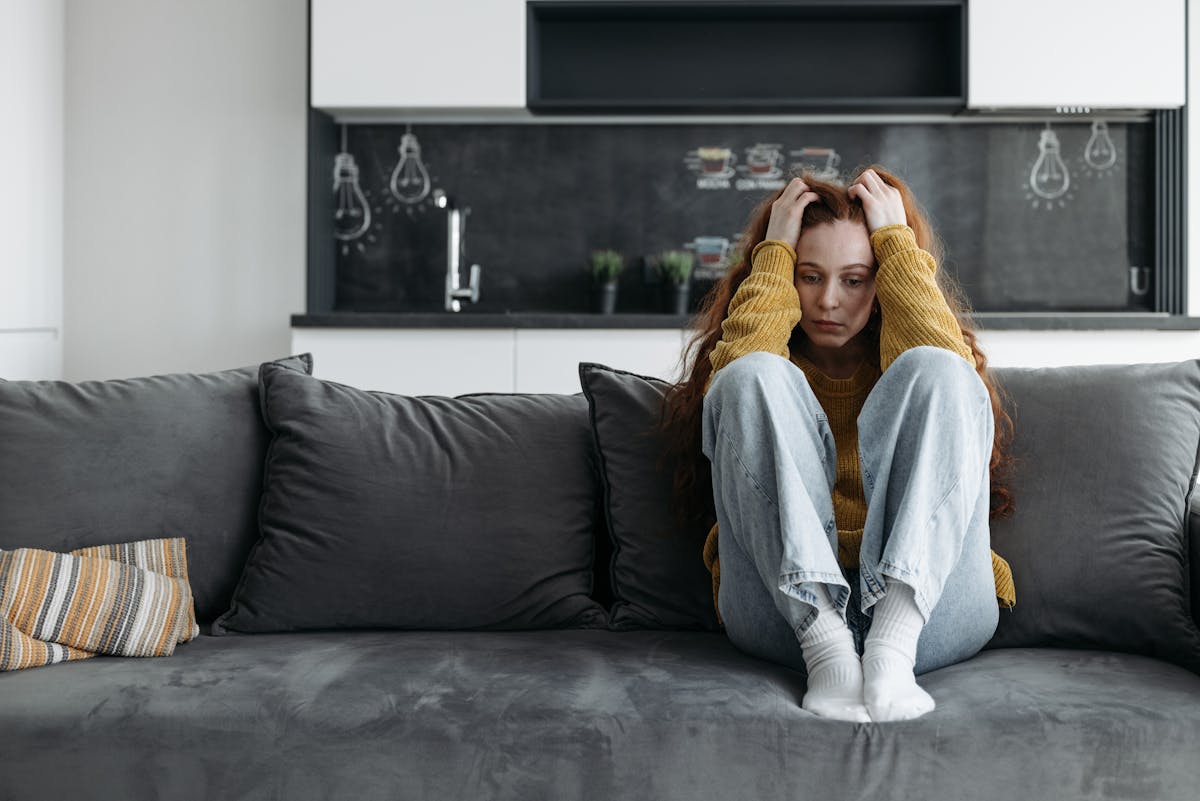 Woman in Sitting on a Couch