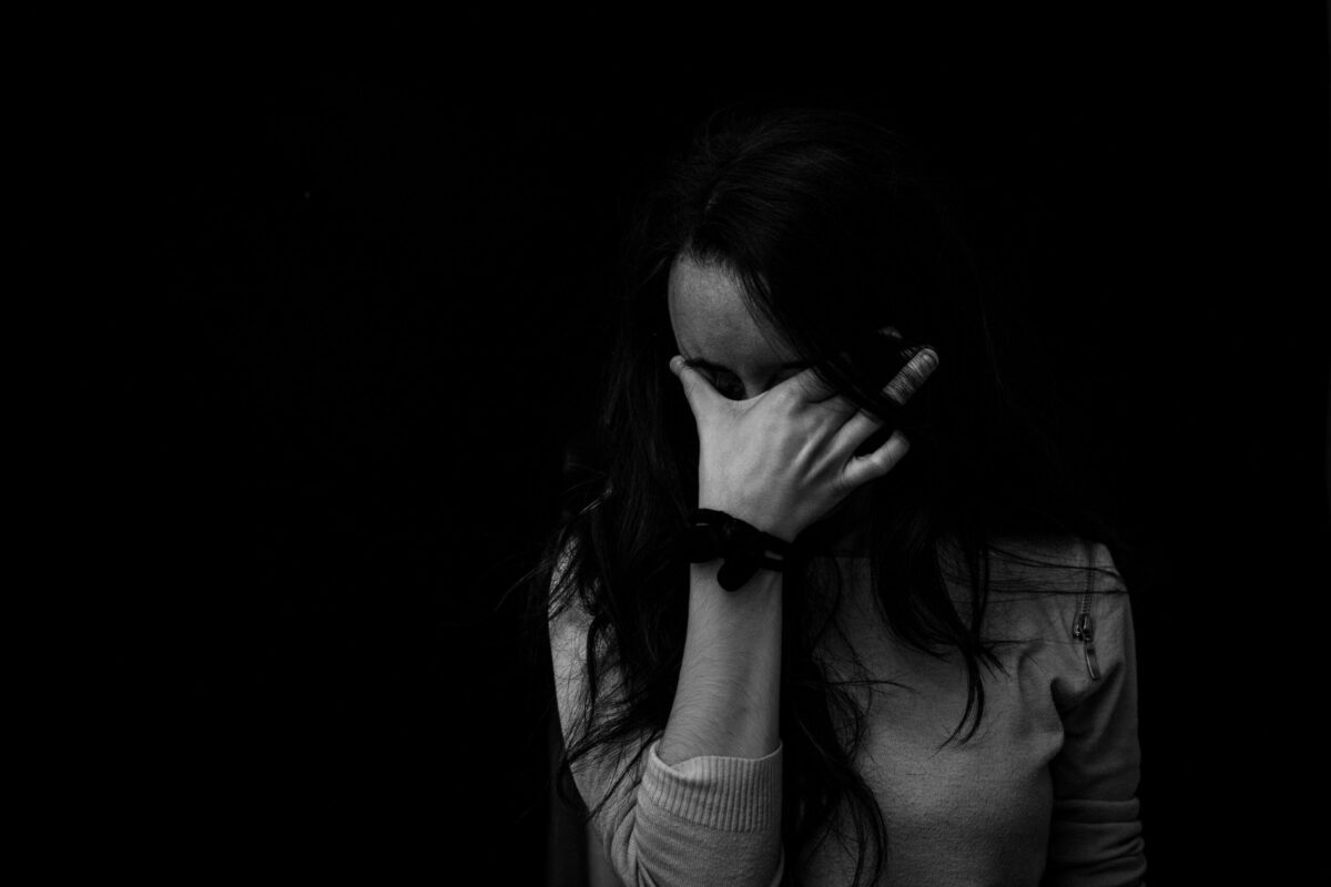A woman experiencing anxiety symptoms.