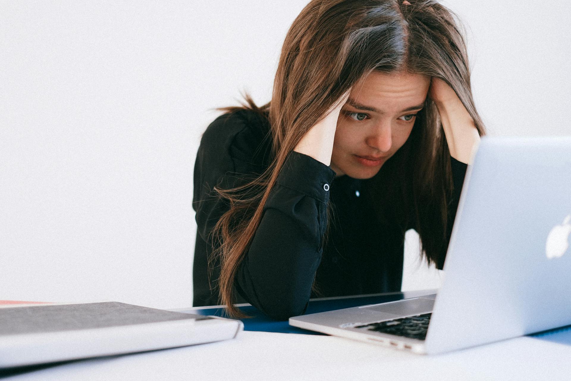 A person who is unaware of the risks of AI therapy using it to get answers about mental health