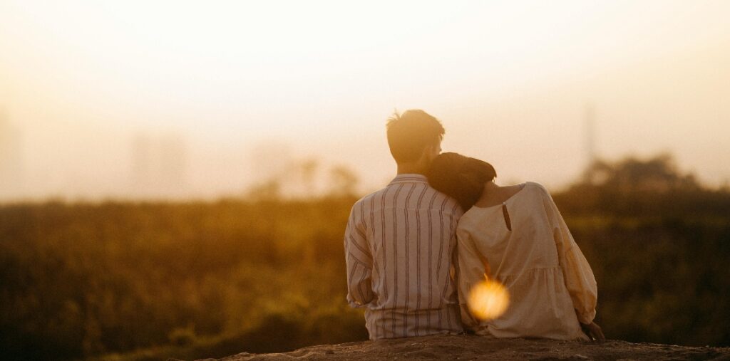 a couple at sunset 
