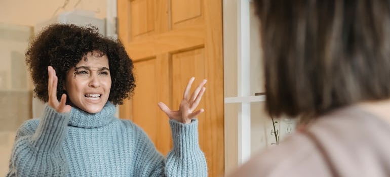 An angry person shouting at their friend