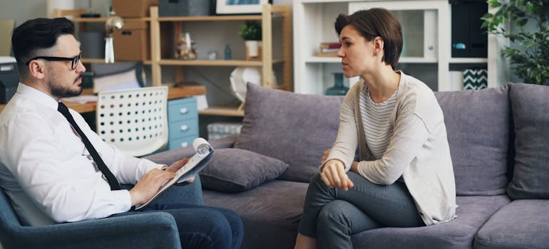 A person talking to a therapist about misconceptions about antidepressants and their emotions