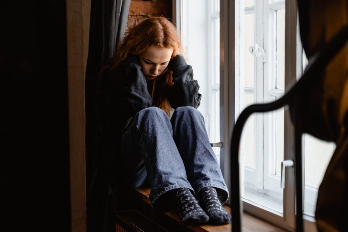 a girl struggling to Support Your Mental Health as the Seasons Shift