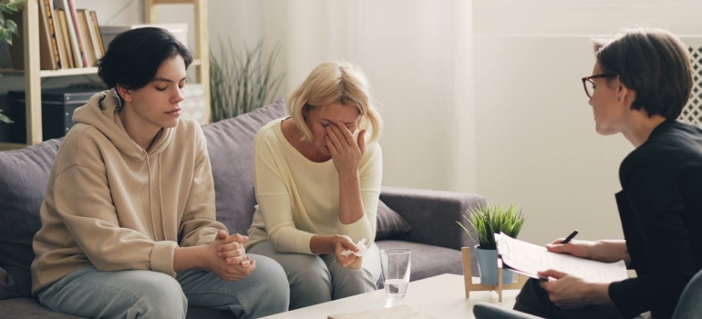 a mother and a daughter in a family therapy session 